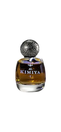 A bottle of Al Kimiya perfume with amber liquid, a clear glass base, and an ornate silver cap, shown against a plain white background.